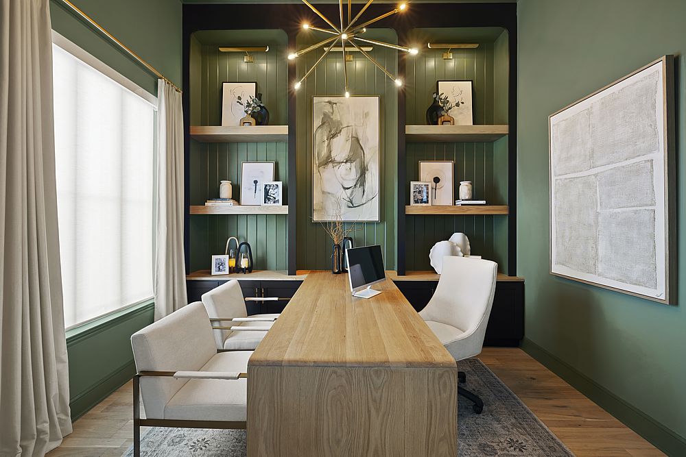 Green paint combined with warm woods make this an office to enjoy.